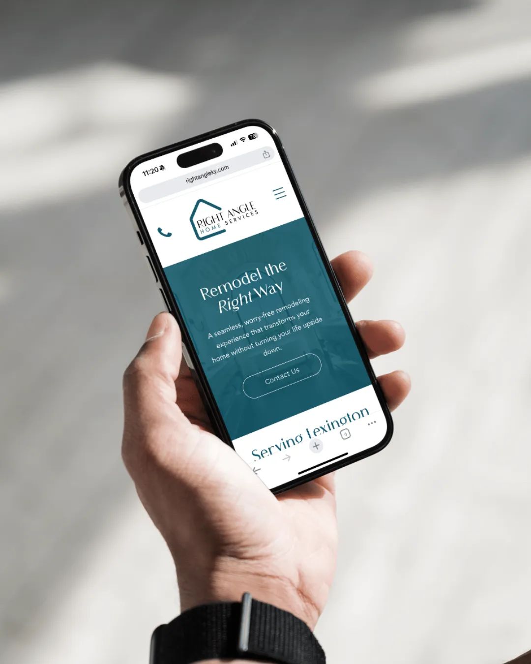 Right Angle Home Services' redesigned website shown on a phone